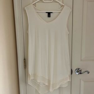 White House Black Market beige sleeves blouse with ruffle details.